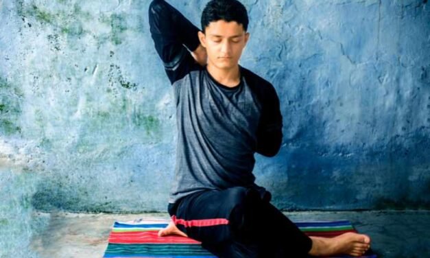 GOMUKHASANA HATHA YOGA POSTURE